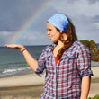 German visitor catches a rainbow, right here in Magical Mangawhai